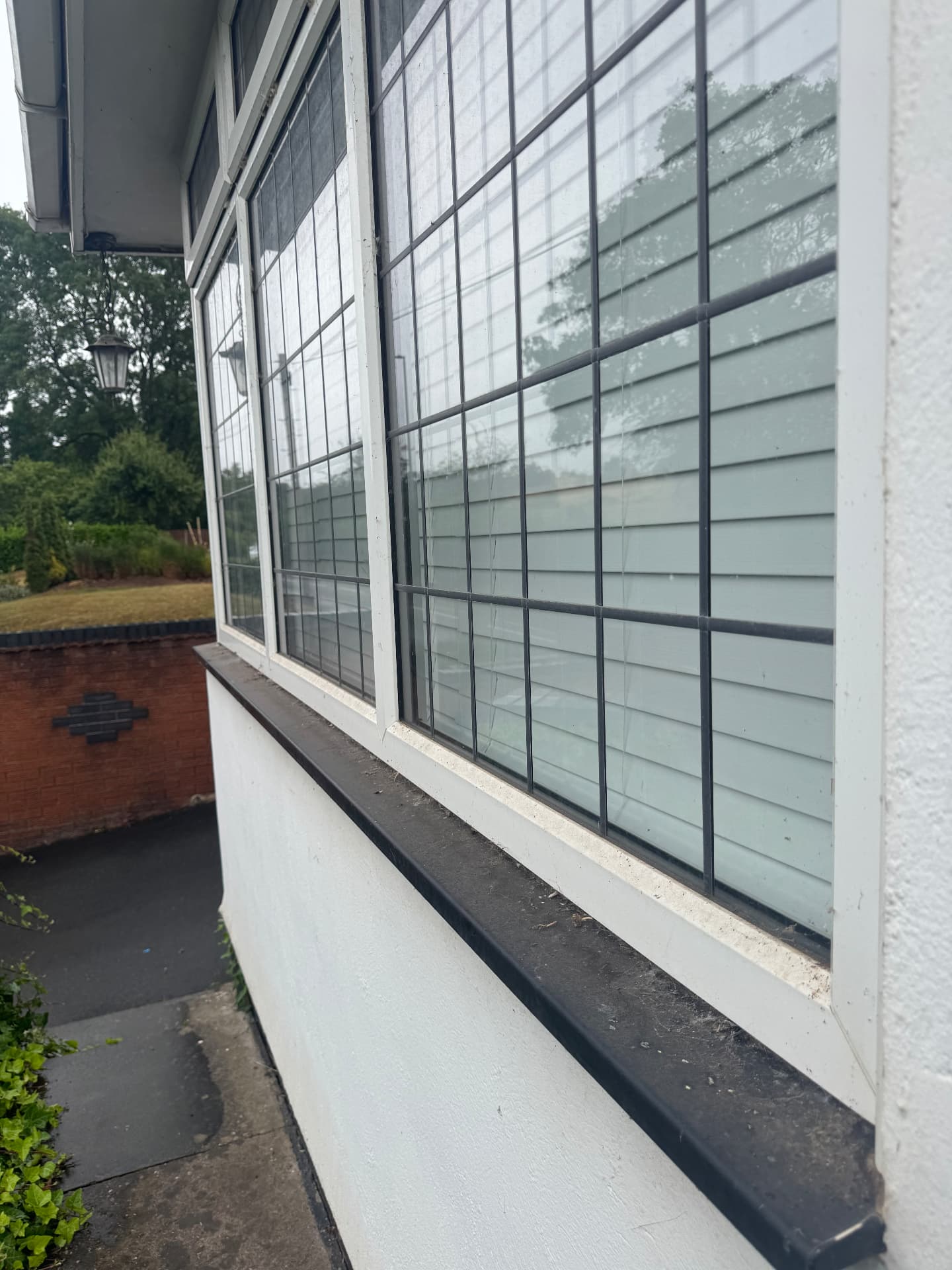 Bay window, frames and sills — before cleaning