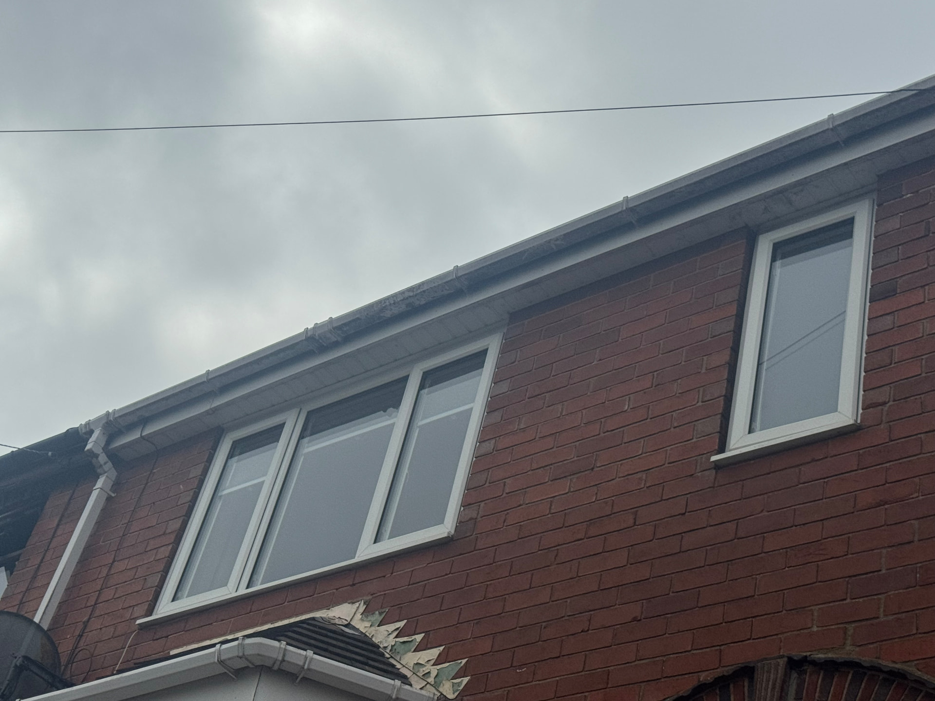 Fascia and gutter line brightened up — before cleaning
