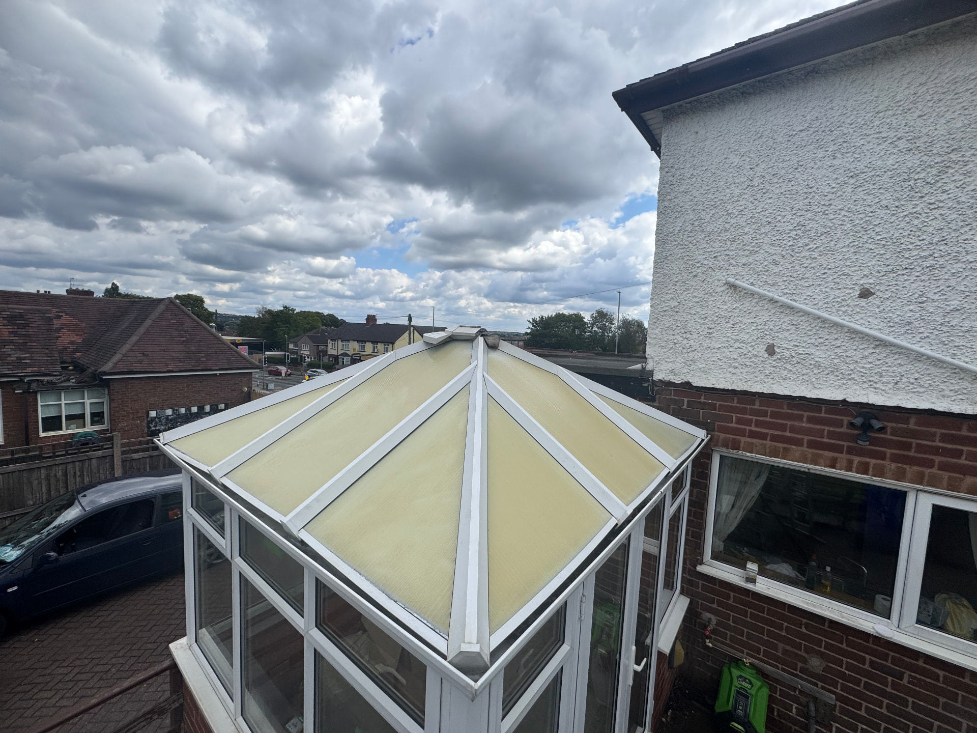 Conservatory roof — moss and algae cleared, panels restored — after cleaning
