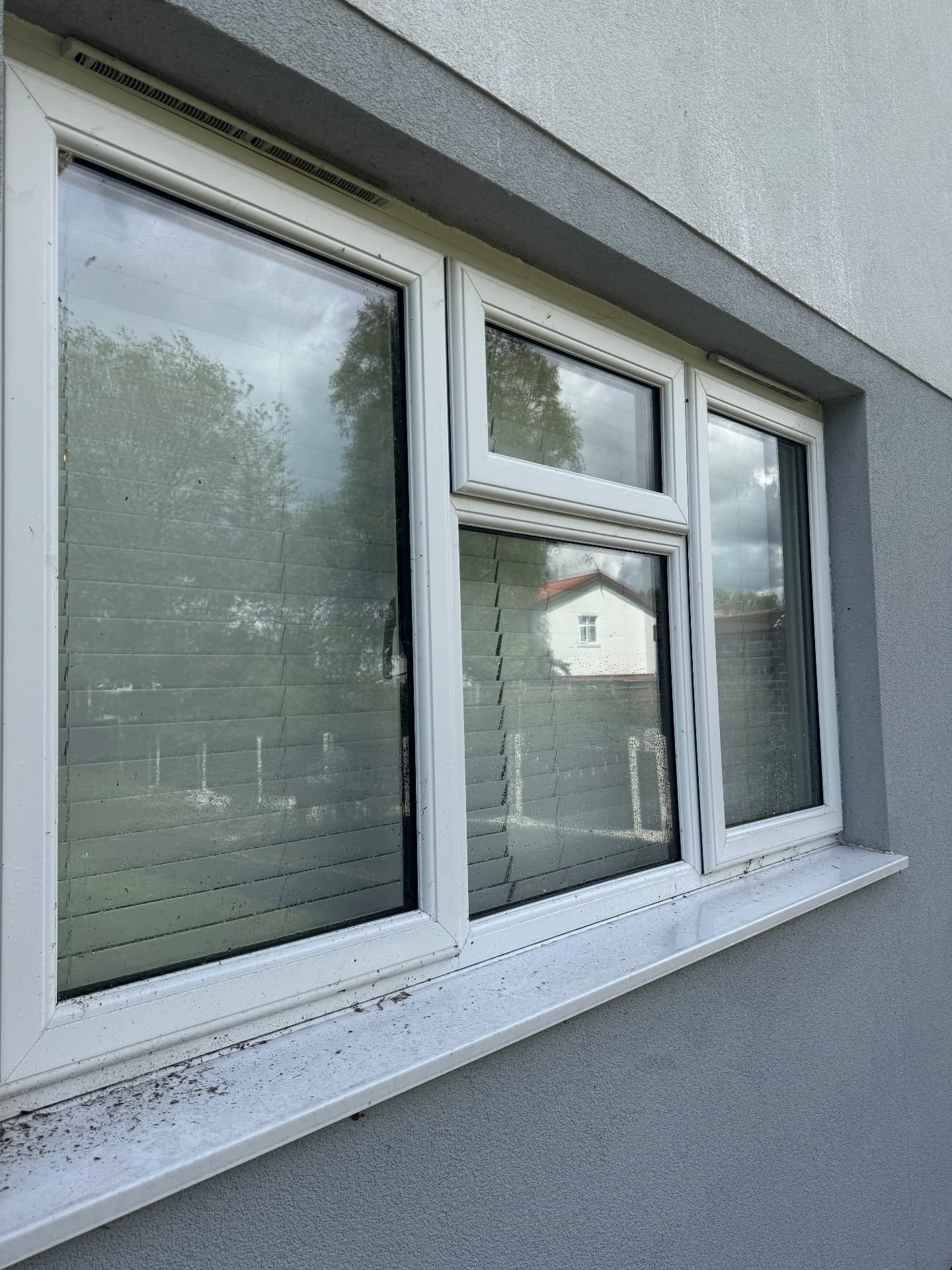 Rear casement windows — before cleaning